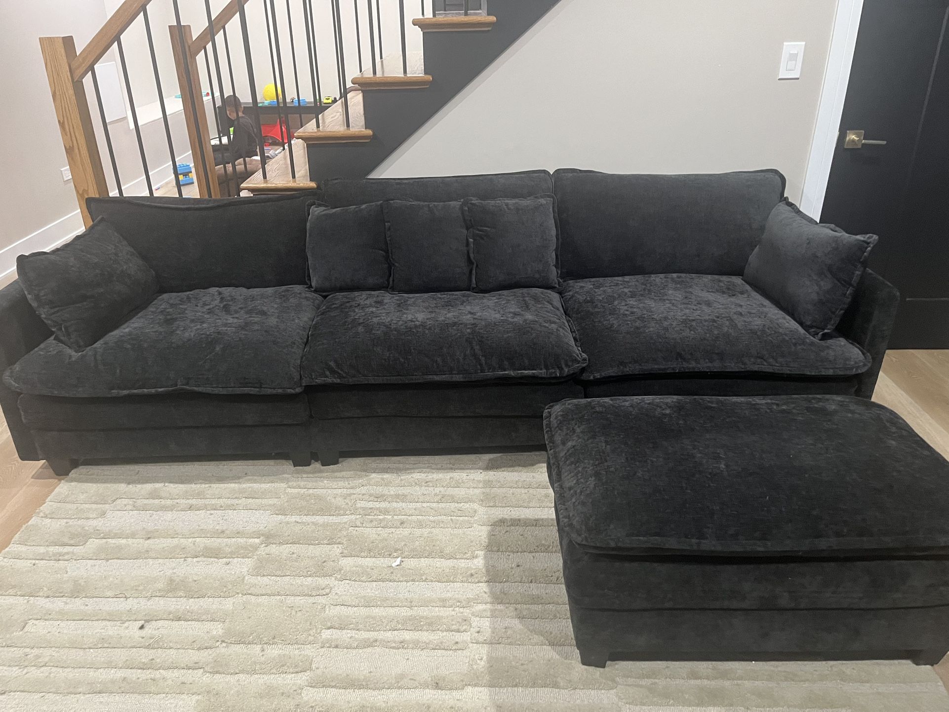 One Black Module Couch With Ottoman