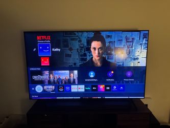 70 inch Samsung smart flat screen tv with a  Samsung surround sound