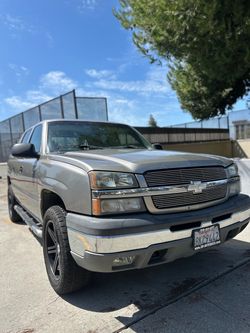 2003 Chevrolet Avalanche 1500 · Sport Utility Pickup 4D