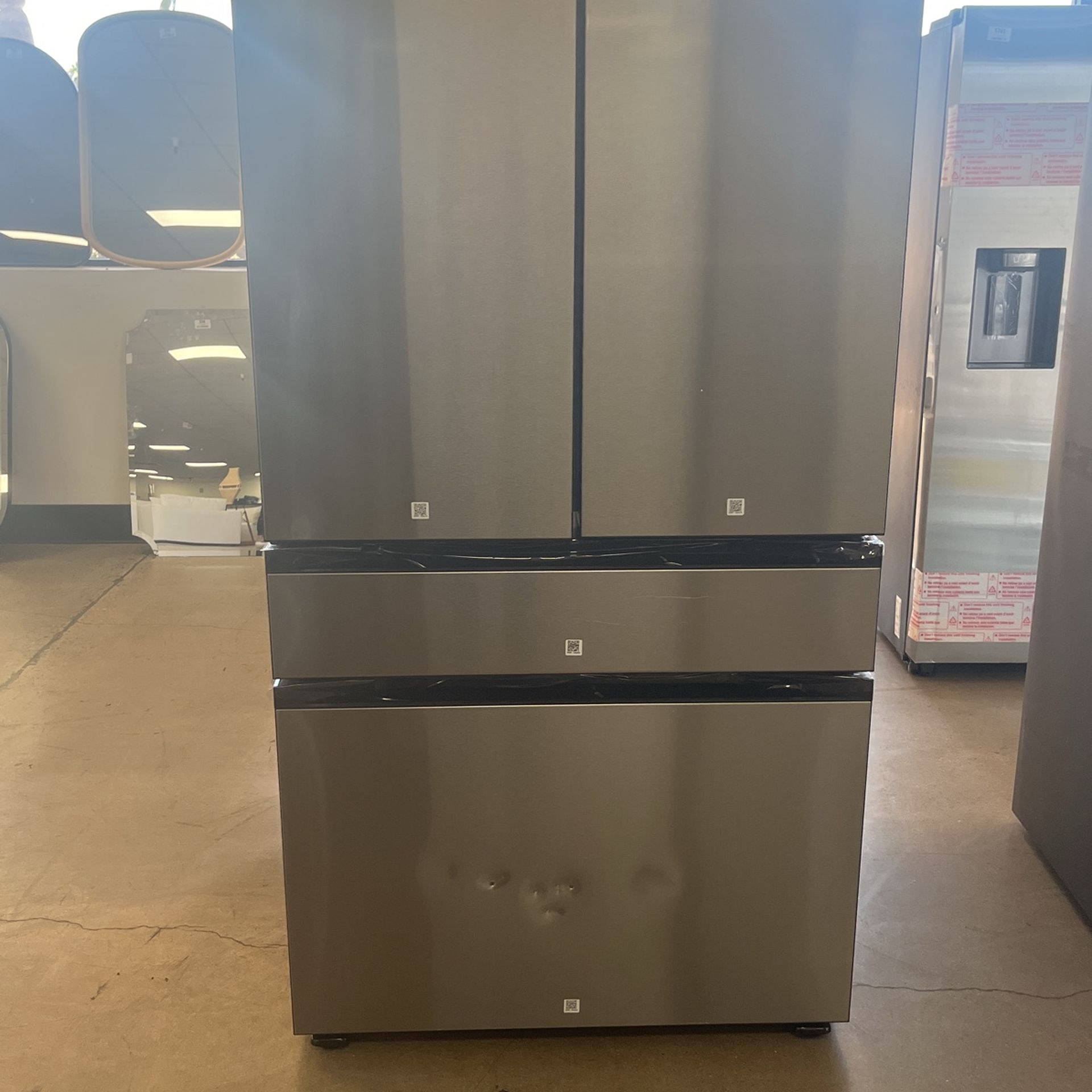 Samsung bespoke 29 ft.³ four-door French door refrigerator with beverage center stainless steel
