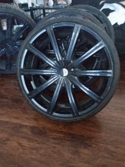 4 Black Kronos rims 22" with tires (sales or trade for 20")OBO