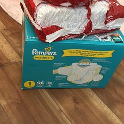 Diapers - Size 1, Huggies and Pampers 