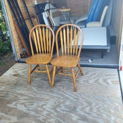 Two wooden chairs for kitchen table