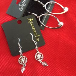 Silver earrings Oval shaped with silver ball  $14    💕🌸 💕  Long earring dangle style with small crystals and flowers 🌺 $ 12 