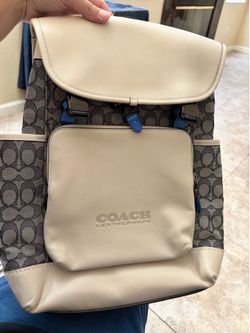Brand new coach backpack with tags on it