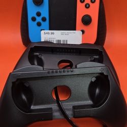NINTENINTENDO SWITCH JOYCON PAIR W/ ACCESSORIES 
