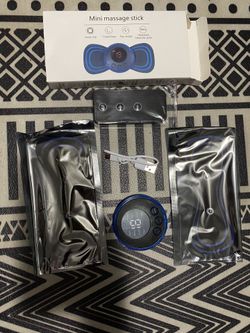 Mini massage stick Portable electric muscle stimulator.   Deep tissue management device. Pulse therapy 