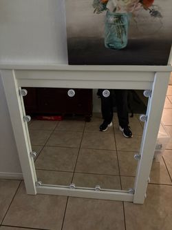 White Framed mirror and a free picture