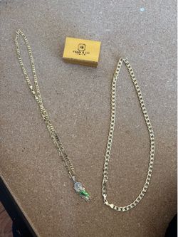 2 gold plated chains San Judas