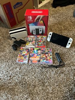 Nintendo switch oled plus 5 games
