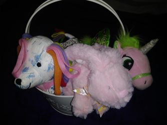 3 stuffed animals in basket