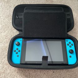 Nintendo Switch With Carrying Case and Accessories 