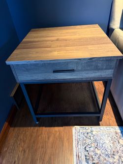 Wood/black metal end table