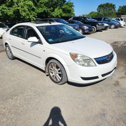 2008 Saturn AURA and 2001 Pontiac Sunfire 