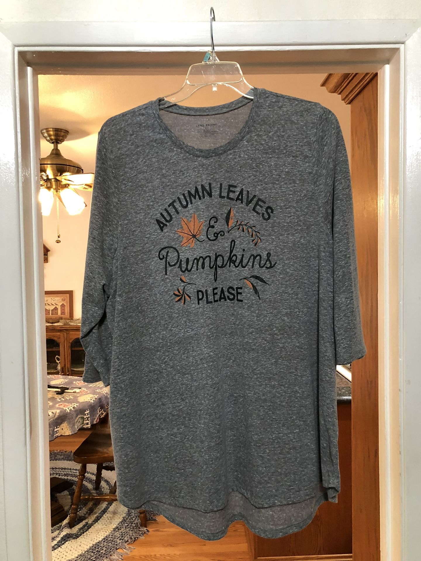 Women’s Size 26 / 28 Long Tunic Length 3/4  Length Sleeves.  On the front it says “Autumn Leaves Pumpkins Please. Brand Lane Bryant.  Made of 50% poly