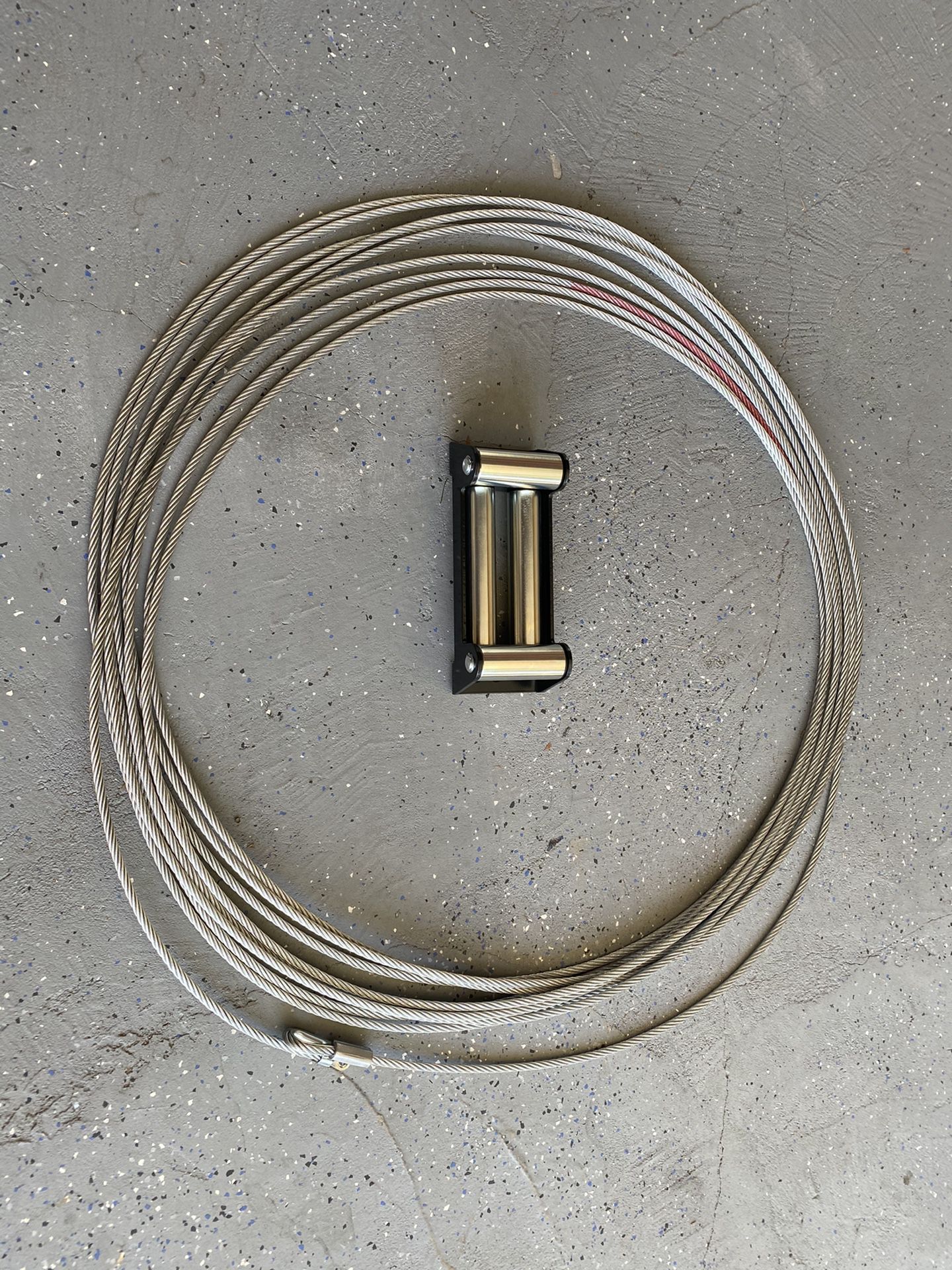Warn 10000lb. wire rope and fair lead. Brand New!
