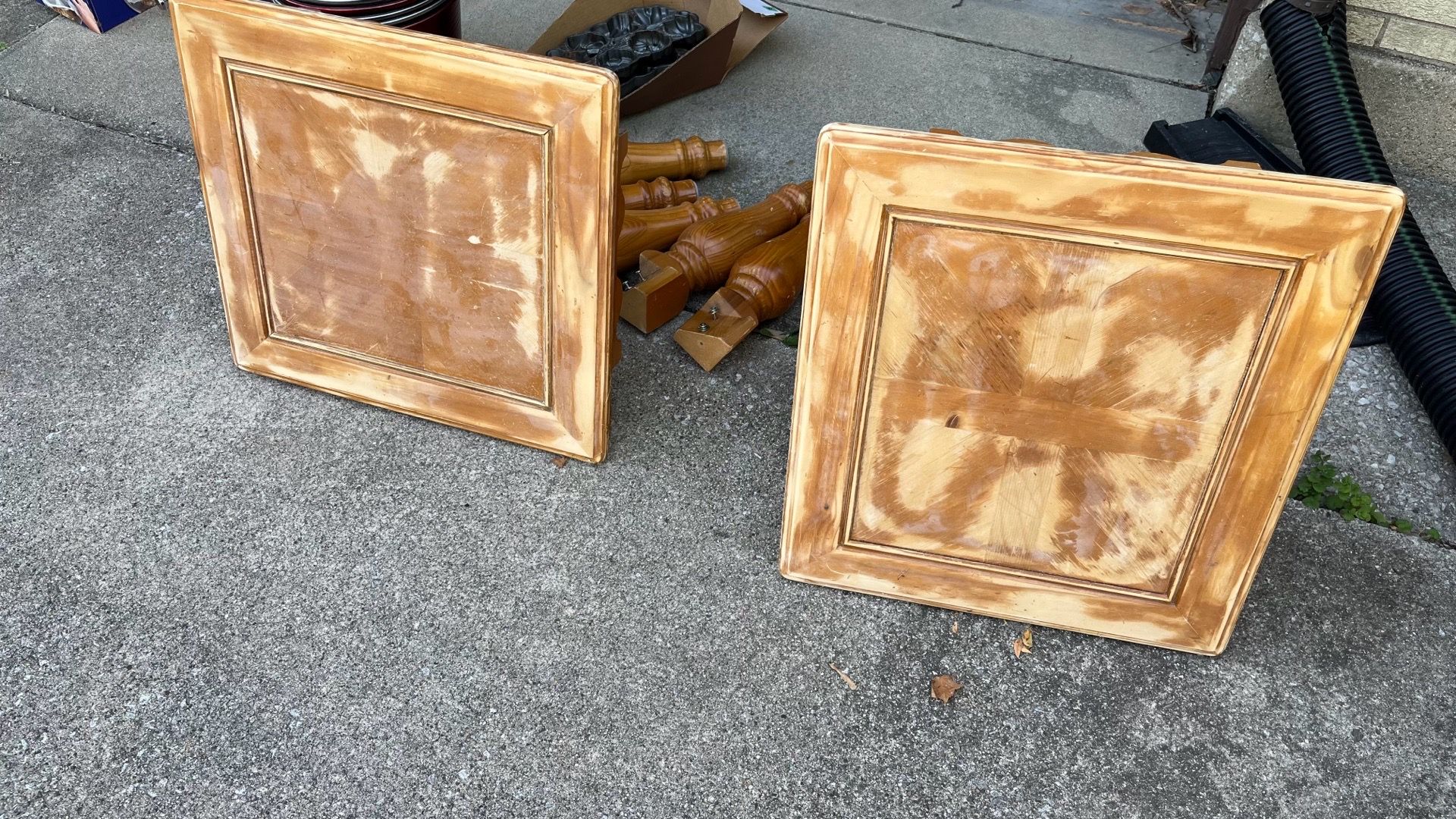 Two solid end tables