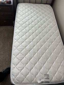 Twin bedframe with mattress