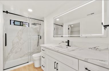 Vanity, Shower Doors, Kitchen Cabinets And Counter Tops