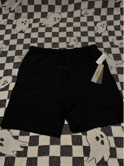 Black essentials fear of god shorts