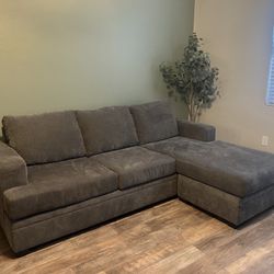 Living Spaces Bonaterra Charcoal 97" Queen Sleeper Sofa with Reversible Chaise