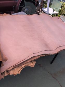 Cowhide leather for sale ,2 dollars per foot rolls, bundles, 10, 20 dollars