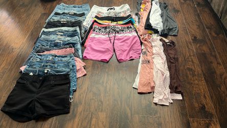 One large bag of  clothes I  have 25 shorts and 19 tank tops