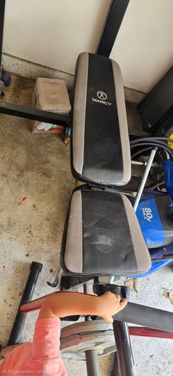 Marcy bench with bar and weights