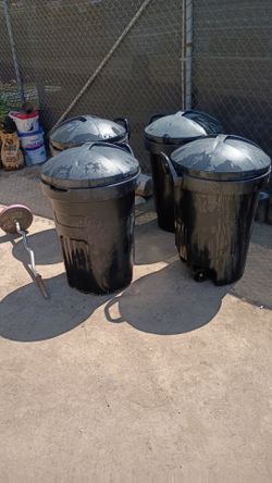 4 Black Plastic Trash Cans with Lids