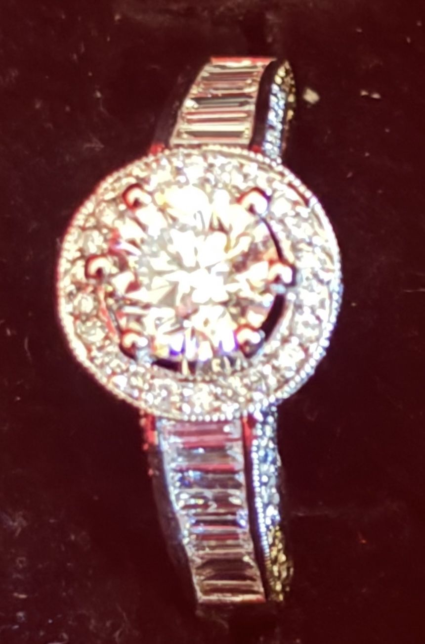Round Halo and Baguette Diamond Ring
