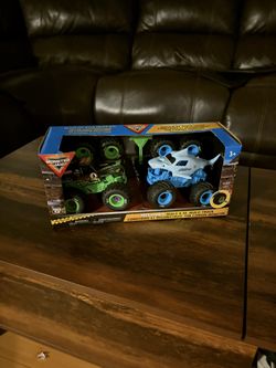 Monster Jam Grave Digger & Megalodon 2pk Light Mini Monster Trucks