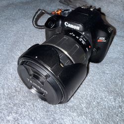 Canon eos rebel t100 camera, 18-55 mm canon lens, Tamron 28-300 mm  AF Aspherical LD lens