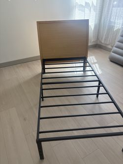 Two Matching Twin Bed Frames / Pier One