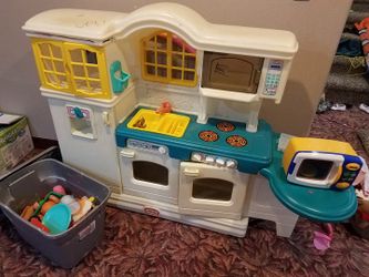 Little Tikes play kitchen set with large lot of food and dishes for Sale