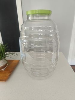 Used 5 gallon clear plastic container for drinks