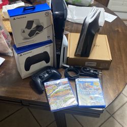 $550 PS5 Slim Bundle, 2 Games, 2 Controllers, Both Cables, Twin Charger and Black Face Plates