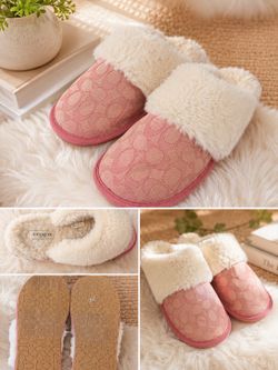 ✨ Cozy and stylish Coach slippers in pink signature monogram design with soft faux-fur lining.