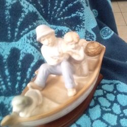 Fishing Figurines Antique 