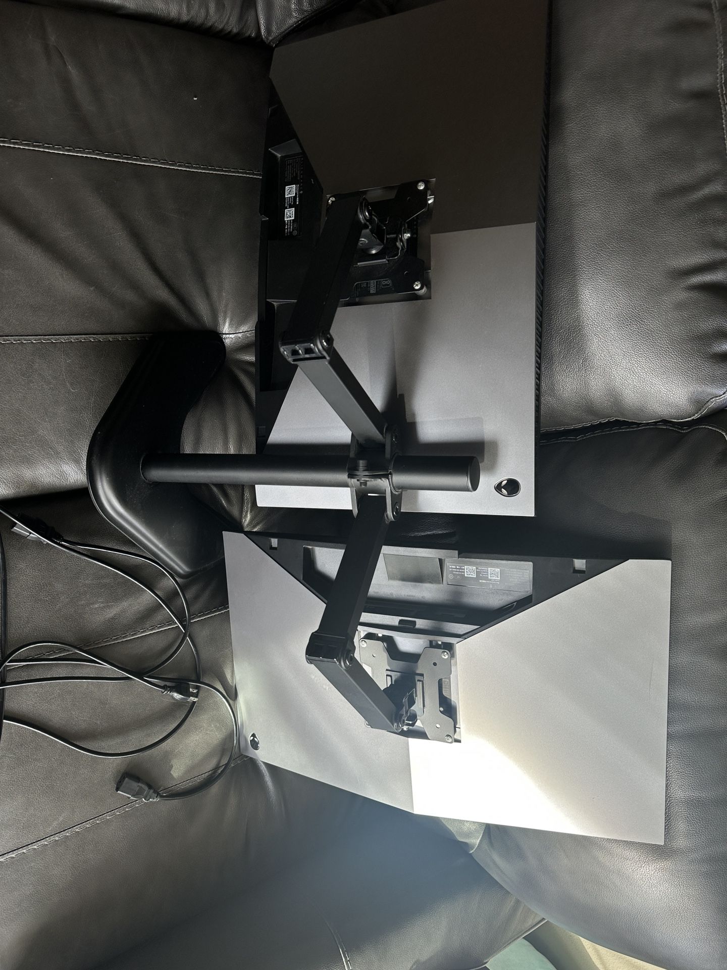 2 Alienware Monitors (AW2518HF) with dual arm stand.