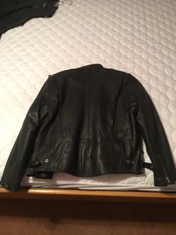 Size XL, perfect condition, zip out quilted fully lined thermal thin dilate insulation, zipper cuffs, pockets and inside pockets, euro snap collar, v