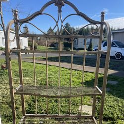 Tall brown metal rack