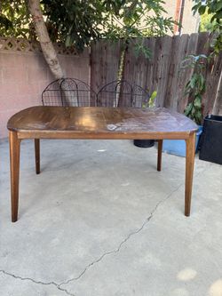 Antique dining table (possible a Mid-Century Modern?) It needs some restoration, Extendable Leaf missing. 60” x  36” x  30” H
