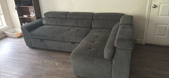SECTIONAL PULL OUT COUCH WITH OTTOMAN