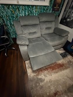 Dual love seat recliner