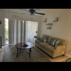 Beige living room couch Bed