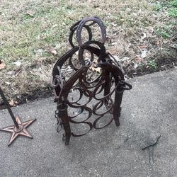 One of a kind western Cowboy wine rack, and cup holder