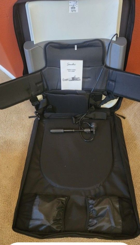 PORTABLE TRACTION FOR BACK. NEVER BEEN USED REG OVER $400