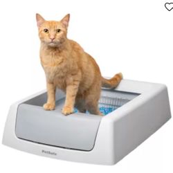 2 automatic litter boxes, 1 reusable metal tray, and 1 bag of litter refill. 