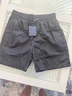 Black Louis Vuitton monogram swim trunks