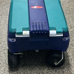 Extra Large Rubbermade Cooler With XL Wheels To Handle Sand. You Can Also Use It As A Seat If Needed. 